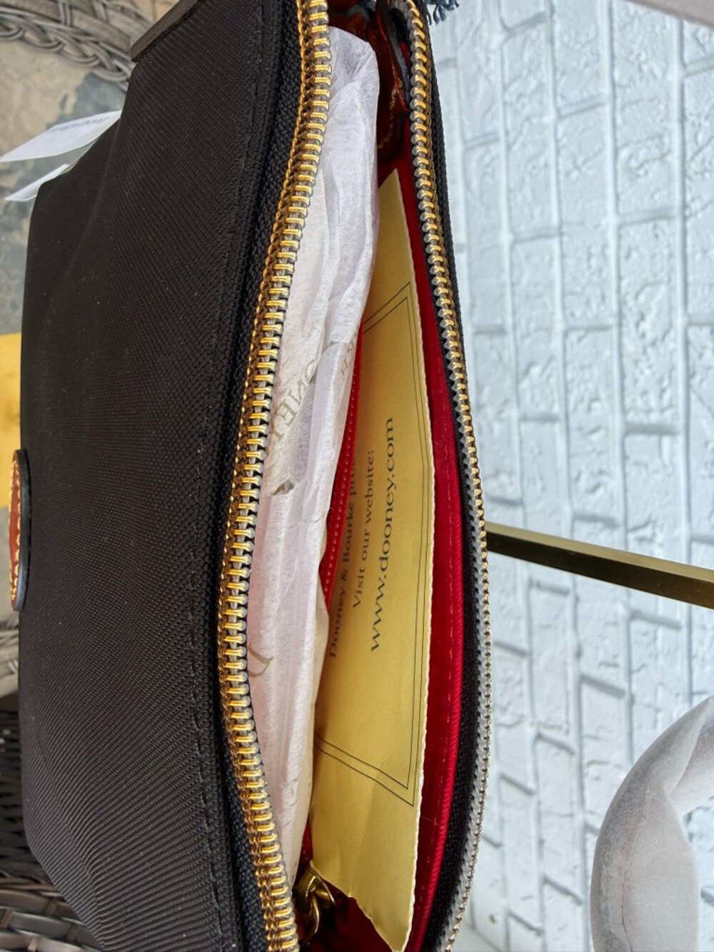 Dooney & Bourke Nylon Crossbody Pouchette - Picture 9 of 10